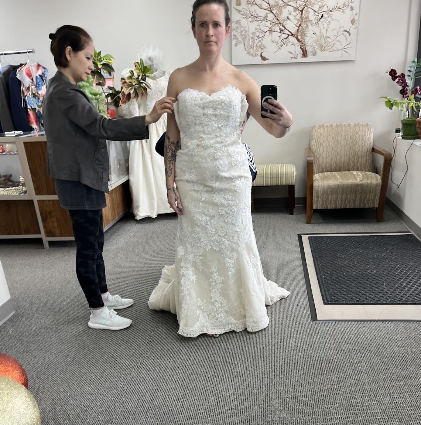 A wedding dress fitting, photo from the shop's Google listing